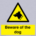 beware-of-the-dog-with-dog-warning-symbol~
